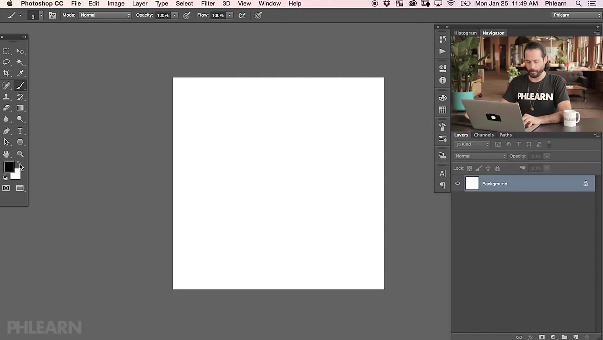 Two black dots of different sizes painted on white canvas