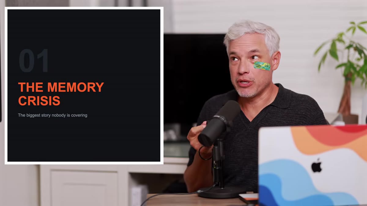 Text on screen: &ldquo;memory crisis&rdquo; with camera price graphic