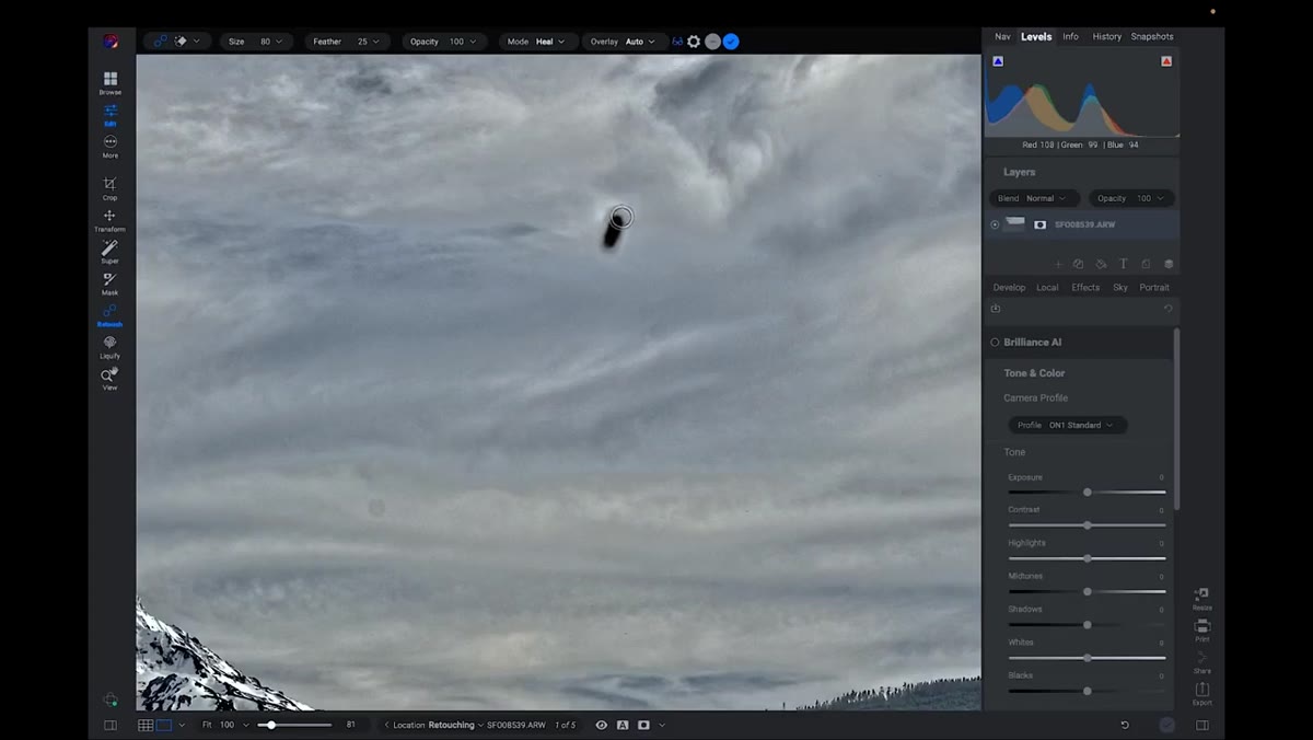 Healing brush settings panel showing feathering at 25
