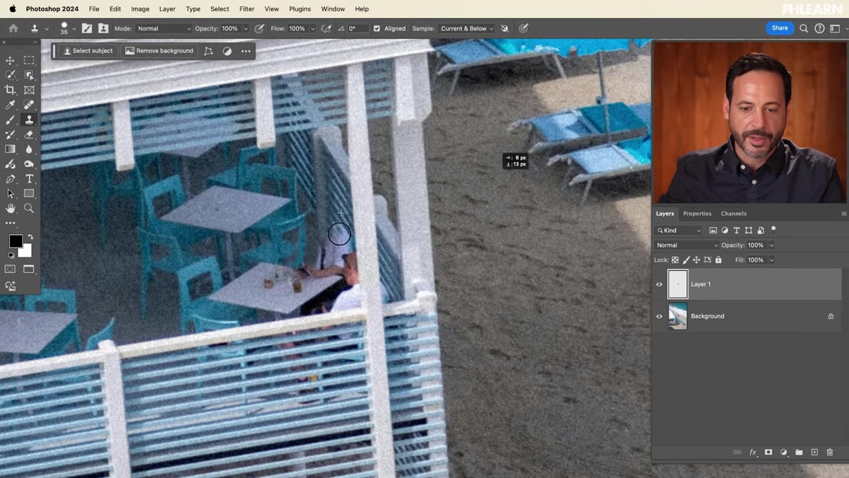 Spot Healing Brush painting over a selected area to auto-blend