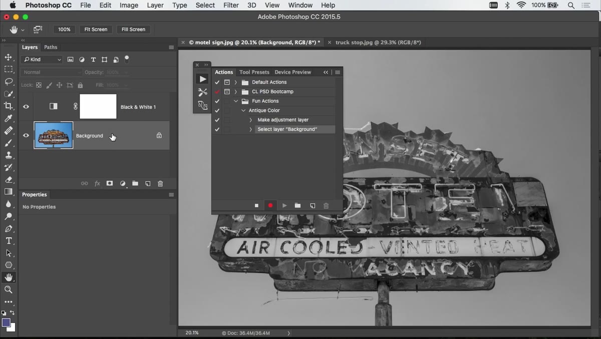 Layers panel showing duplicated layer being dragged above adjustment layer