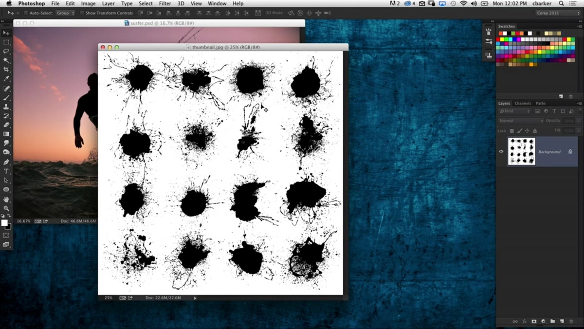 Black ink spatters on white background ready for brush conversion