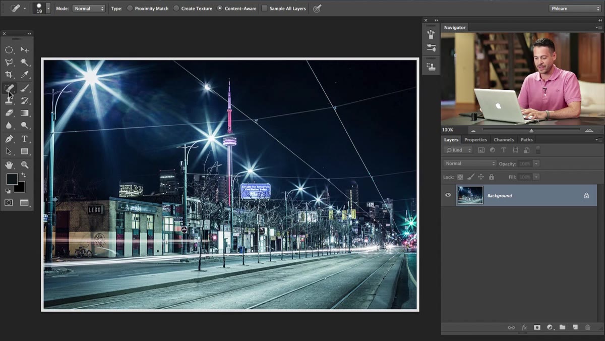 Photoshop toolbar with patch tool highlighted in panel