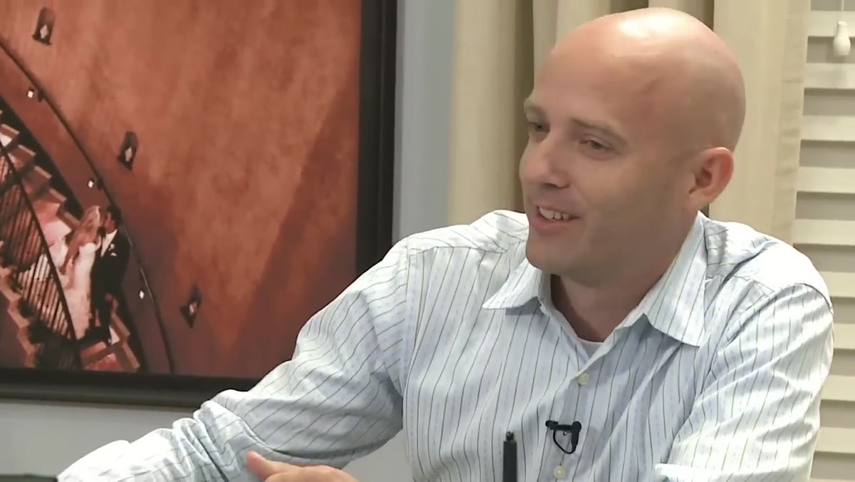 Jared Platt speaking to camera after slideshow ends