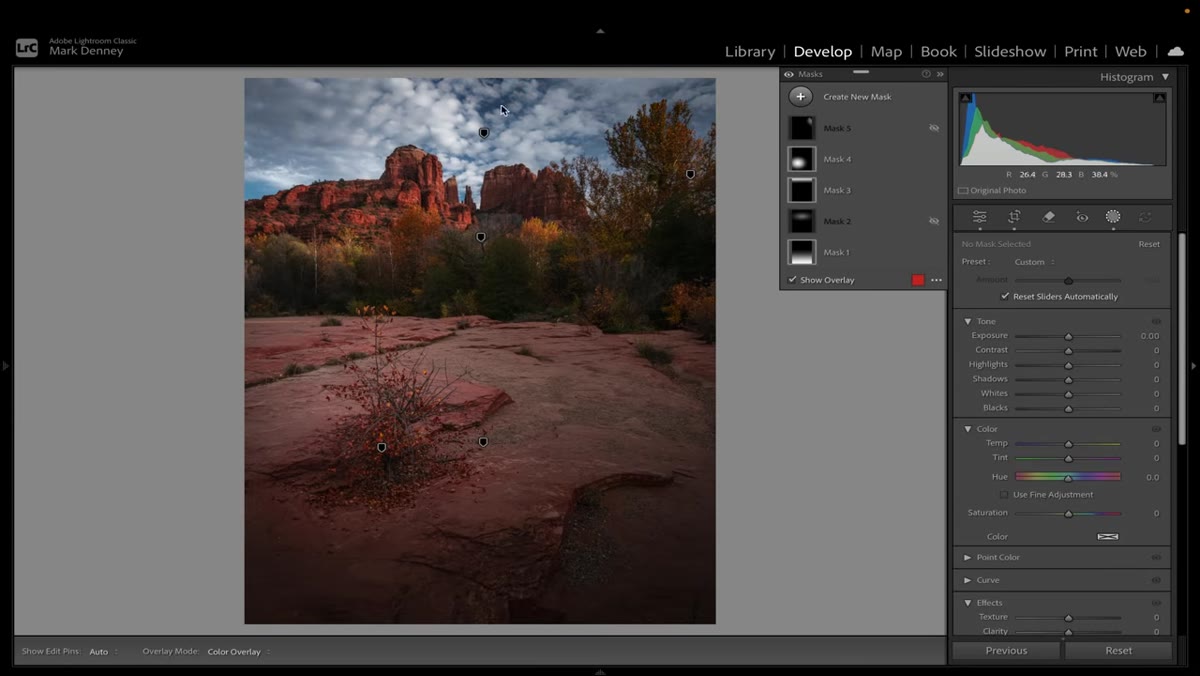 Gradient mask darkening upper sky edge acting as compositional lid