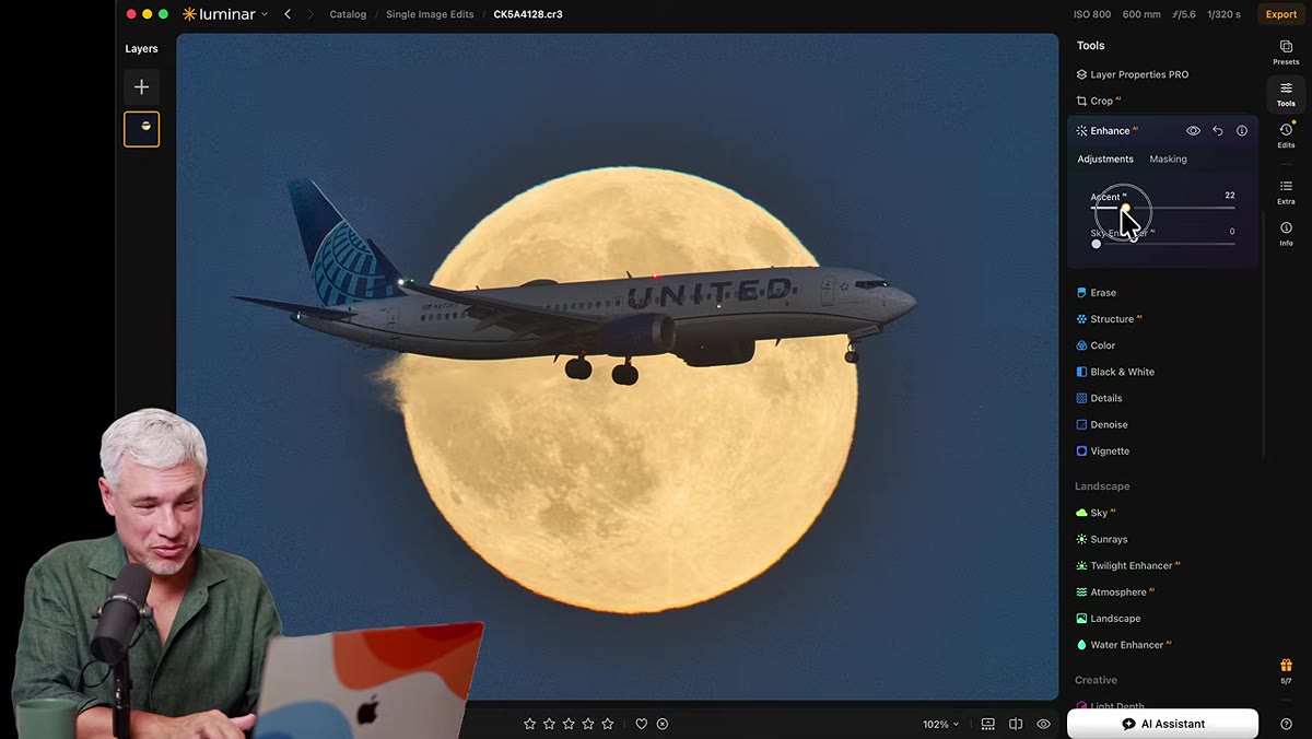 AI Enhancement slider being dragged to the right