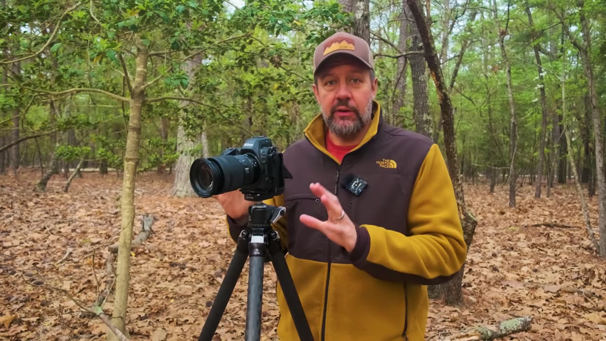 Camera in full manual mode, exposure dial being turned