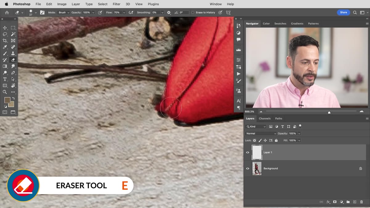 Eraser tool cleaning up a weird artifact near the subject&rsquo;s toe